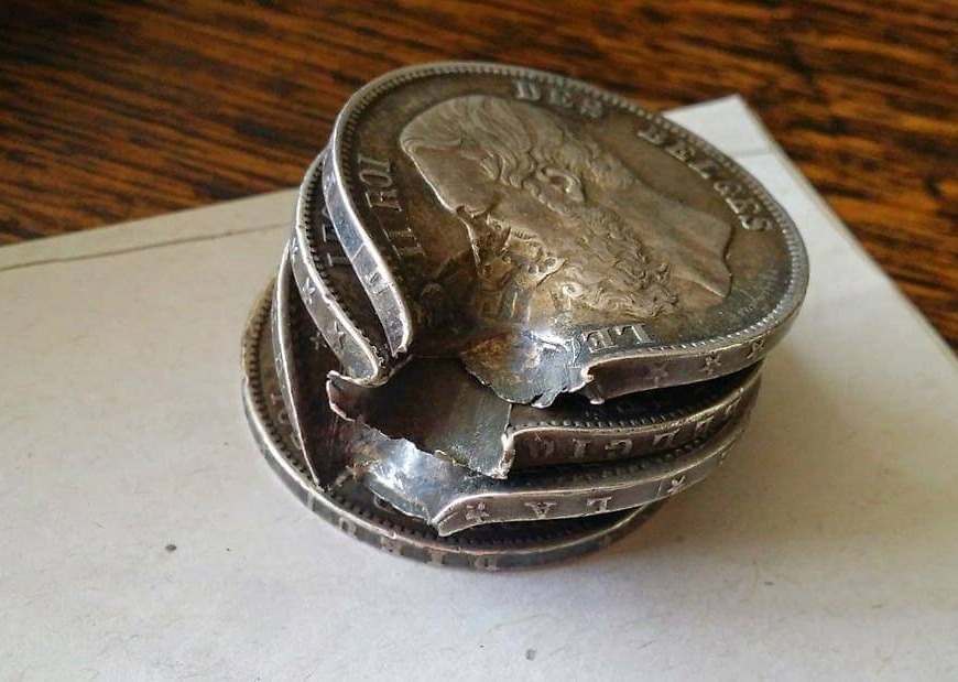 Six coins in a World War I soldier’s pocket got him discovered and shot. They also saved his life.